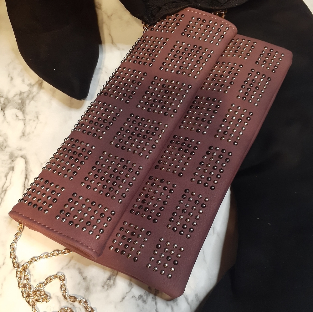 Purple studded clutch